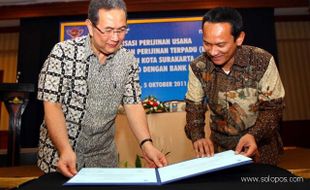 NOTA KESEPAHAMAN APKOMINDO DAN BANK MANDIRI