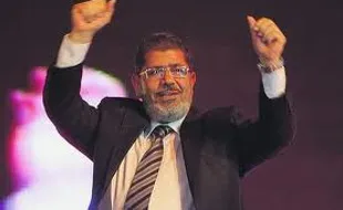 MOHAMMED MORSI Segera Bentuk Pemerintahan Sipil 