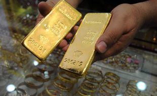 HARGA EMAS HARI INI : Harga Jual dan Buyback Emas Antam Turun Rp4.000/Gram