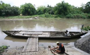 PERBAIKI PERAHU