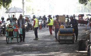 TAMBAL JALAN BERLUBANG