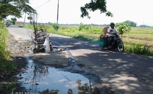 JALAN BERLUBANG