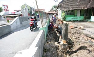 PELEBARAN SAYAP JALAN