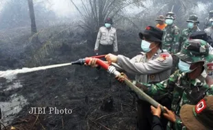 KABUT ASAP : Kebakaran Hutan Riau Libatkan 14 Perusahaan