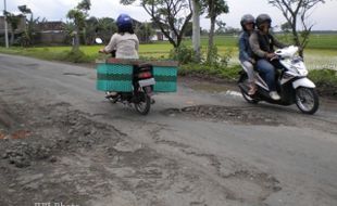 JALAN TELUKAN-CUPLIK RUSAK PARAH