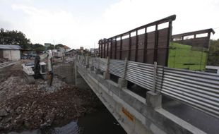 PEMBANGUNAN JEMBATAN KOMPLANG