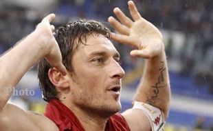 Totti Isyaratkan Pensiun 