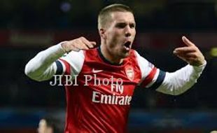 PLAY OFF LIGA CHAMPIONS : Podolski Jadi Tumbal Kemenangan Arsenal