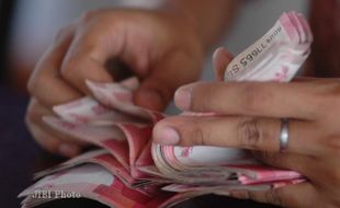 KURS RUPIAH : Nilai Tukar Rupiah Melemah 33 Poin