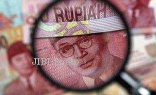 Rupiah Menguat, Ditutup Rp11.265 per Dolar AS