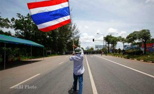 HARGA KARET ANJLOK : Aksi Unjuk Rasa Petani Karet Thailand Meluas