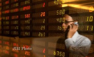 BURSA SAHAM: IHSG Sulit Lepas Dari Profit Taking, Beli 13 Saham Ini