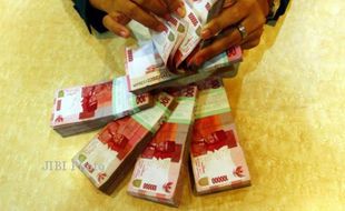 KURS RUPIAH : Nyaris Tembus Rp14.150/dolar AS, Rupiah Tertekan Ekonomi Global