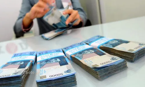   NILAI TUKAR RUPIAH : Rupiah Melemah 0,56% 