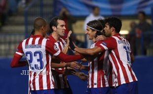 ATLETICO MADRID VS AUSTRIA WINA : Gasak Wina 4-0, Atletico ke 16 Besar