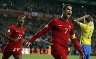  PORTUGAL VS SWEDIA : Tandukan CR7 Bawa Portugal Taklukan Swedia