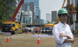 BANJIR JAKARTA : Jokowi Buka Pintu Air Waduk Pluit