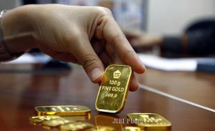 HARGA EMAS : Jelang Akhir Pekan, Harga Jual dan Buyback Emas Antam Stagnan