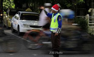 FOTO NATAL : SUPELTAS BERTOPI KHAS NATAL