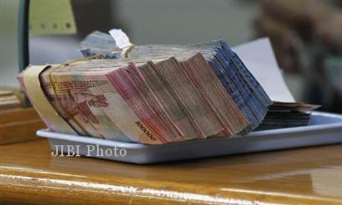 KURS RUPIAH : Nilai Tukar Rupiah Menguat ke Rp11.795/US$