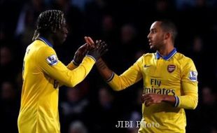 BOXING DAY LIGA PREMIER :  Brace Walcott Bawa Arsenal Kembali ke Puncak, Newcastle Menang Besar