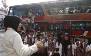 FOTO UJIAN KOMPETENSI KEJURUAN :  Berperan Sebagai Tour Guide