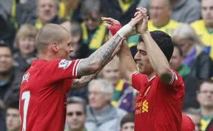 NORWICH 2-3 LIVERPOOL : Suarez Ciptakan Gol Bersejarah Bagi The Reds