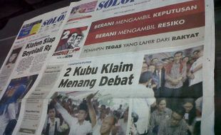 SOLOPOS HARI INI : Dua Kubu Klaim Menang Debat Capres, Unjuk Rasa Jelang PD 2014 hingga Bunuh Diri Sukoharjo