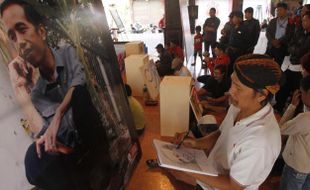 FOTO JOKOWI CAPRES : Seniman Lukis Jokowi di Masa Kampanye Pilpres