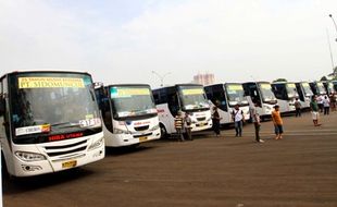 MUDIK LEBARAN 2014 : Tiket Arus Balik Ludes, Pemerintah Siapkan 100 Bus Tambahan