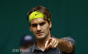 KABAR PETENIS : Main Bareng Hingis, Federer Optimistis Sambut Olimpiade 2016