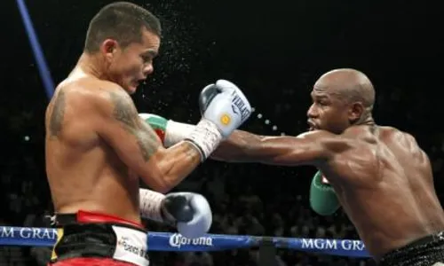 TINJU DUNIA : Mayweather Menang Angka atas Maidana