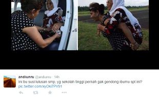 TRENDING SOSMED : Heboh Foto Susi Pudjiastuti Gendong Ibu-Ibu