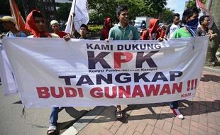 BUDI GUNAWAN TERSANGKA : Saksi Kasus BG Mangkir, Polri Bantah Melawan KPK