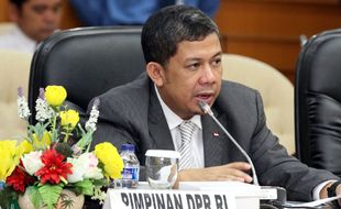 REVISI UU KPK : DPR Yakin Presiden Takkan Tarik Revisi UU KPK