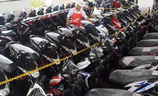 PENJUALAN MOTOR : Honda Pilih Turunkan Profit