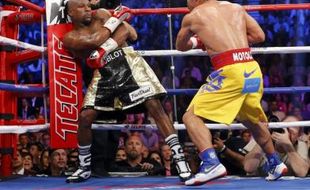 TINJU DUNIA : Mayweather Jr Menang Angka atas Paquiao