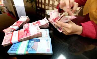 KURS RUPIAH : Rupiah Dibuka Melemah 7 Poin, Tunggu Efek Lanjutan Stimulus Pemerintah