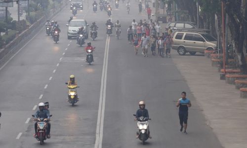 KABUT ASAP SUMATRA : Kabut Asap Berisiko Picu Kanker Paru-Paru