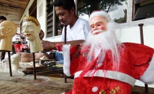 Foto Wayang Potehi Warnai Natal Jombang