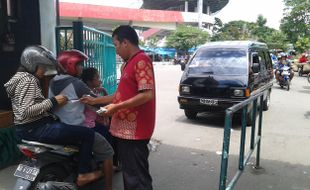 RETRIBUSI SOLO : Pengunjung di Manahan Hanya Ditarik Biaya Parkir, Namun Pengunjung Tetap Membayar Rp2.000/Motor