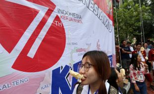 FOTO HUT RI : Meriahnya Lomba Makan Kerupuk di CFD