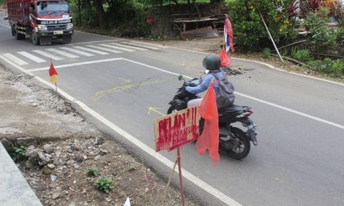 BENCANA PONOROGO : Tanah Gerak di Slahung Bikin Jalan Ponorogo-Pacitan Merekah