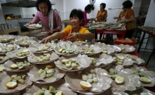 TIONGHOA JOGJA : Lontong Cap Go Meh, Simbol Pembauran Budaya