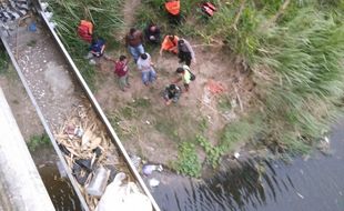 Sosok Perempuan Misterius Bunuh Diri dengan Terjun di Sungai Madiun