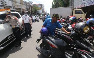 Nuthuk Tarif Parkir saat Libur Lebaran, Seorang Jukir Ditangkap Polisi Jogja