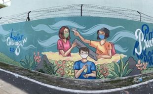 Mural Protokol Kesehatan Karya KKN UNS Tim 118 Hiasi Dinding di Gilingan