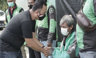 Gojek Fasilitasi Penyerahan BPJS TK Bagi Driver di Semarang