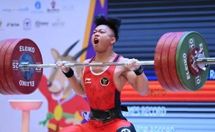 Keren! Lifter Rahmat Erwin Abdullah Juara Dunia Lagi