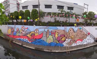 Mural Siap Sambut Penumpang Perahu Wisata Grebeg Sudiro Solo, Ada Ceritanya lho